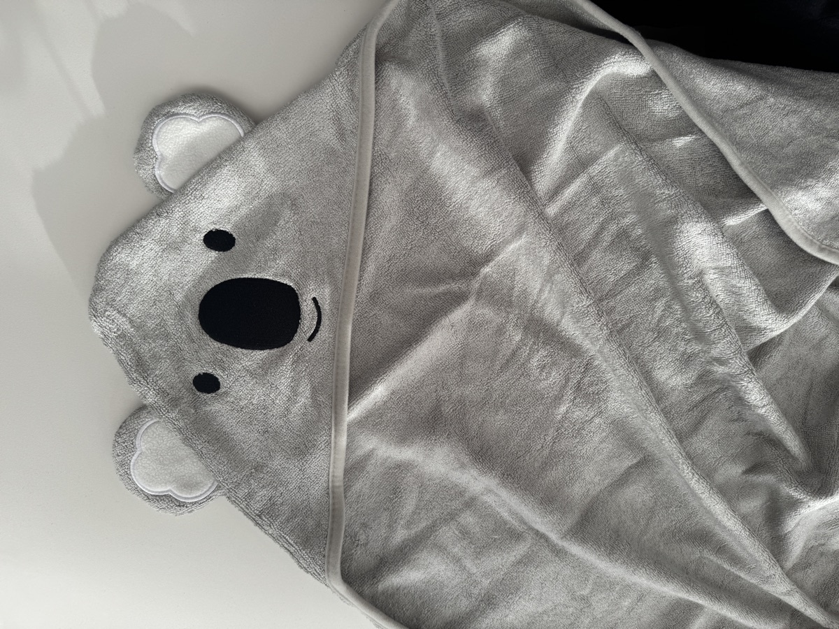 The Koala hooded towel on a baby